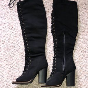 Knee-high lace up boots